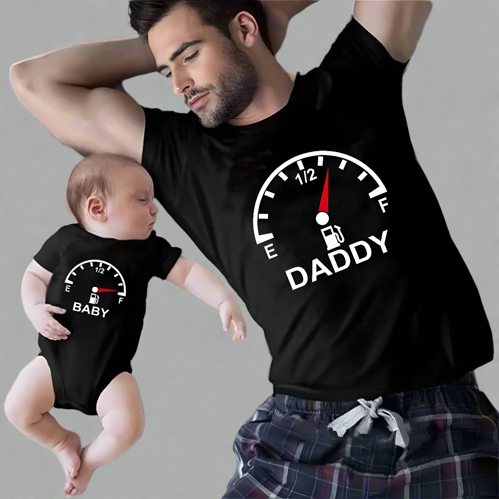 Dad and baby wearing matching fuel gauge T-shirts – low fuel for daddy, full fuel for baby