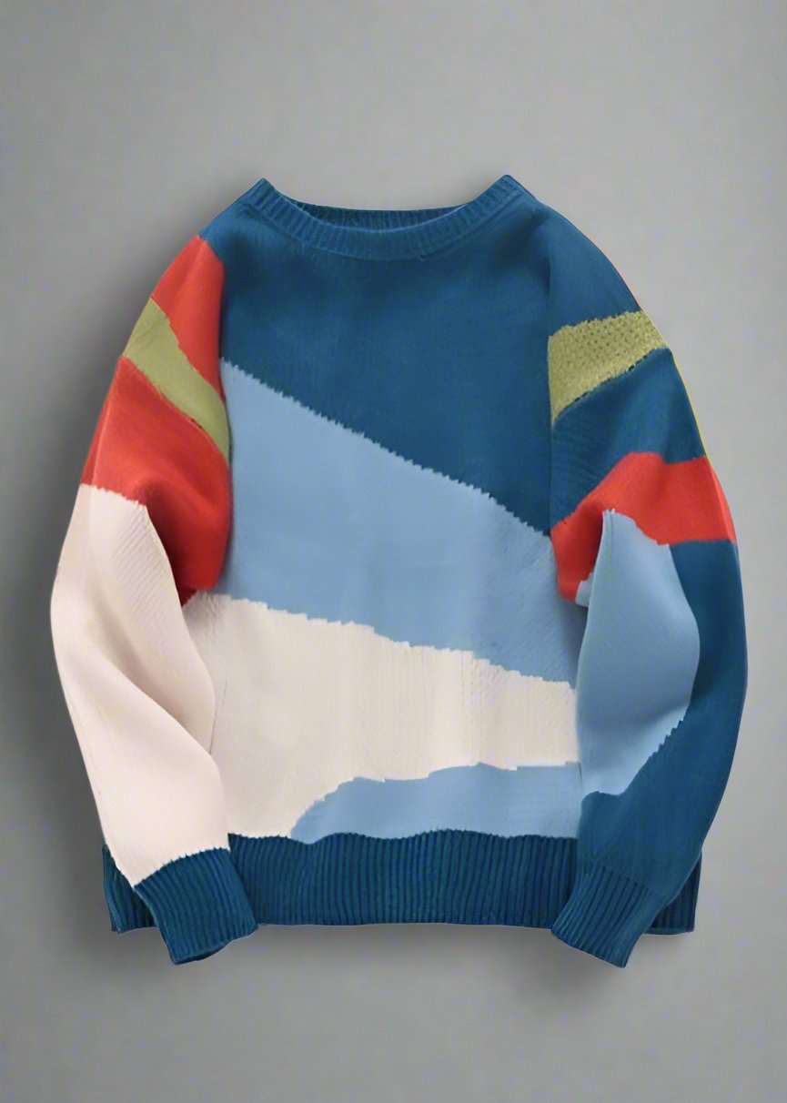 Mother and child in coordinated color block knit sweaters with vibrant design