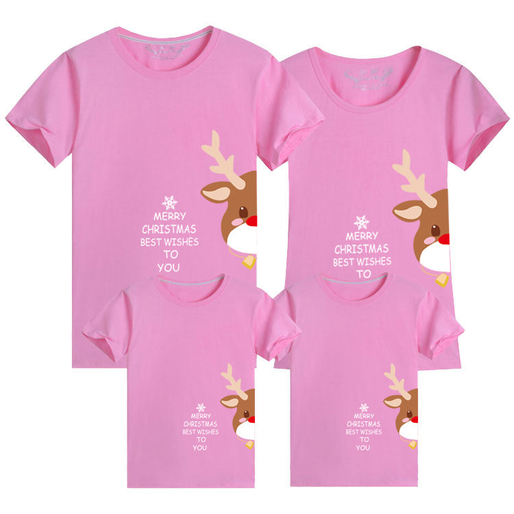 Holiday-themed pink family t-shirts with a cheerful reindeer and Christmas design