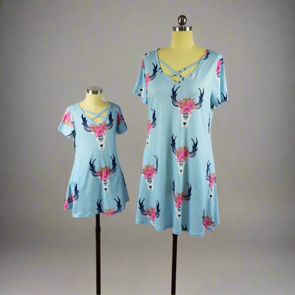 Mom and daughter in matching blue floral antler print dresses
