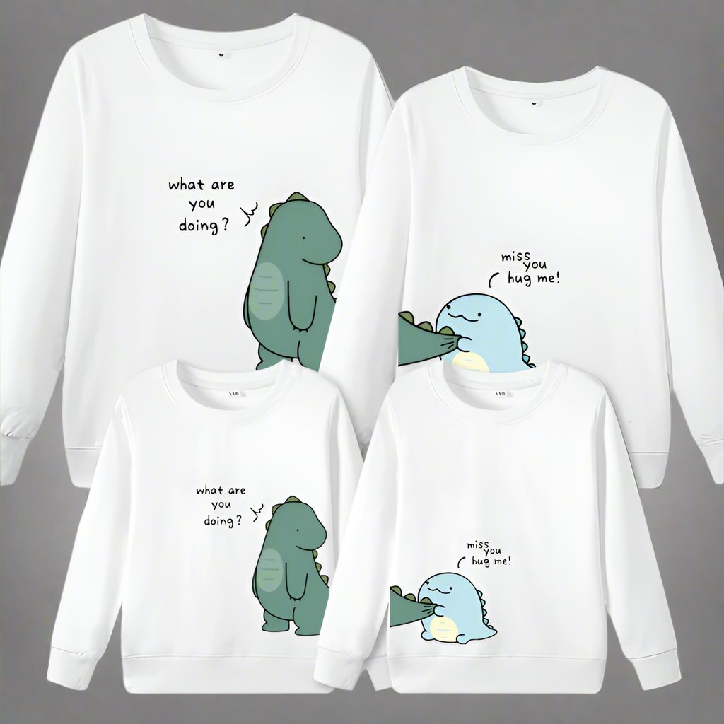 Pastel-colored dinosaur sweaters for family matching outfits, with funny phrases on each