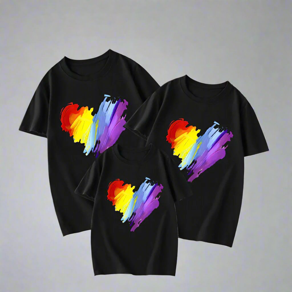White, yellow, and red family t-shirts featuring a rainbow heart brush stroke prin