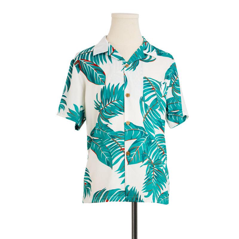 Close product view of family matching matching sets with white green tropical print