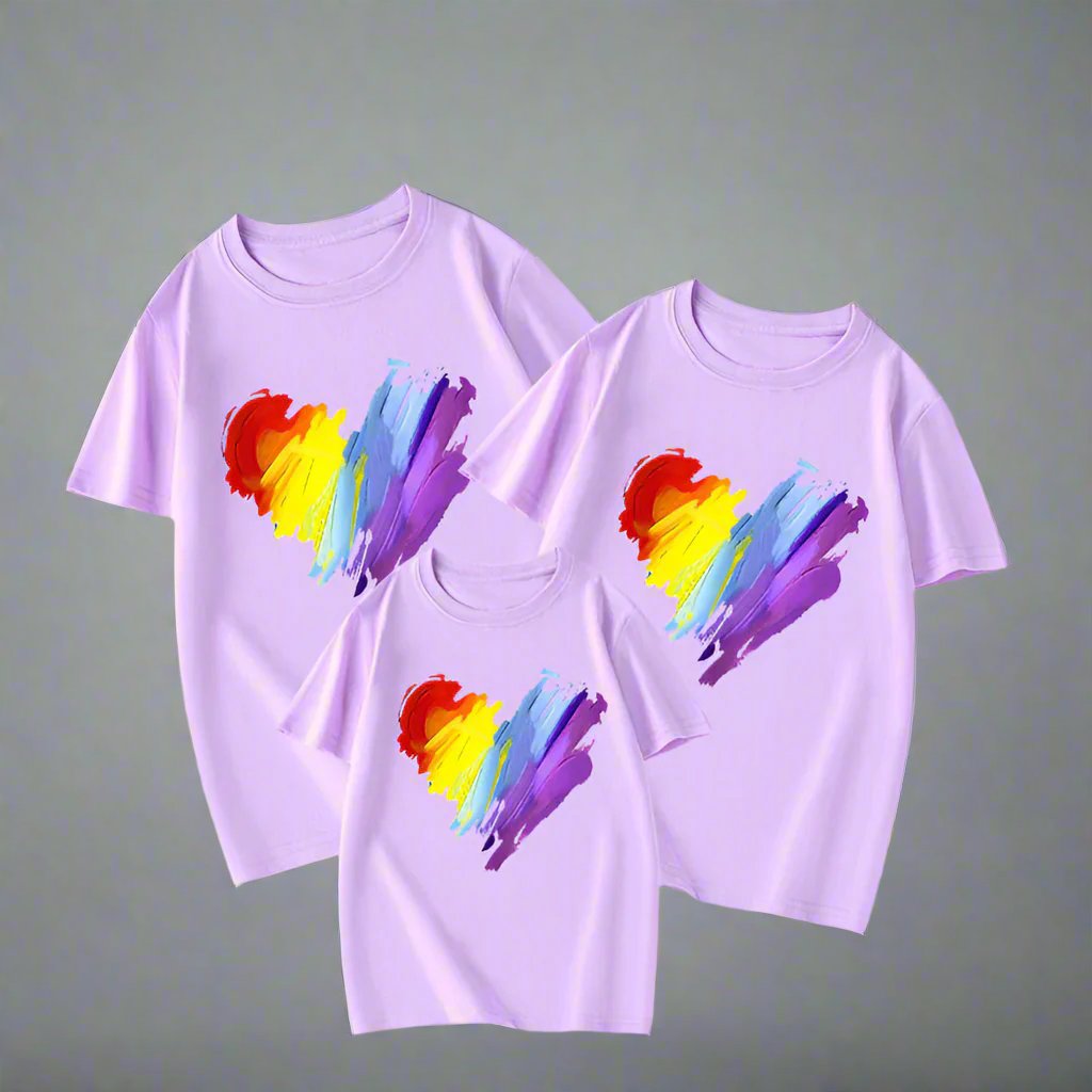 Family t-shirt set with a painted rainbow heart design for coordinated family outfits