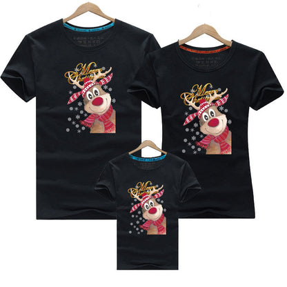 Black family matching holiday tees with reindeer design and winter snowflake details