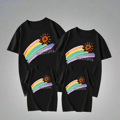 Bright rainbow and sun family matching shirts with 'Beautiful' message