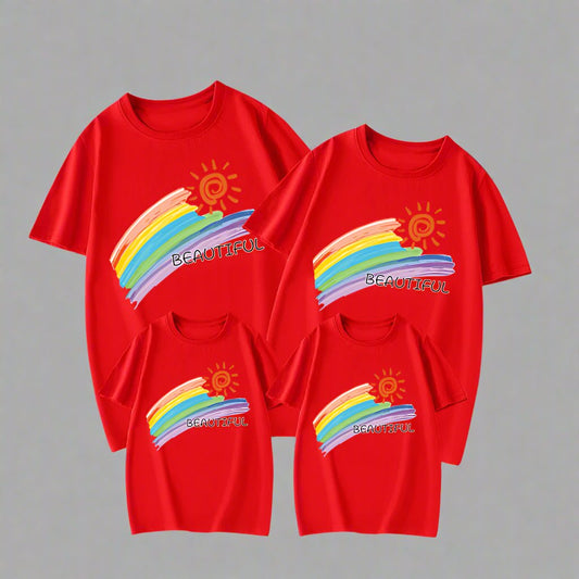 Family matching shirts with a colorful rainbow and 'Beautiful' text design