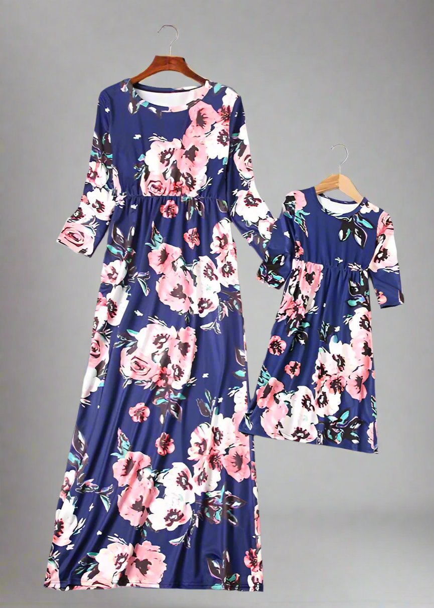 Coordinated navy blue floral maxi dresses for mother and daughter, perfect for casual and formal events