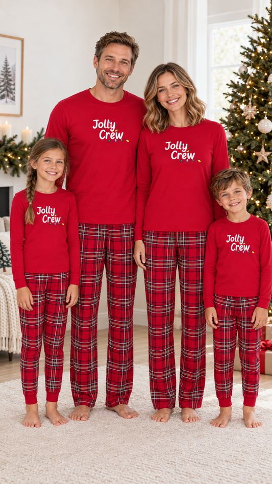 Family in matching red Jolly Crew pajama tops and red plaid pants.