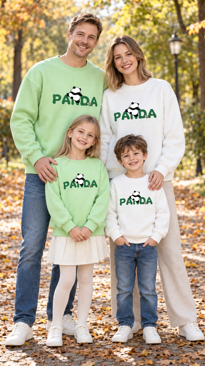 Family in matching green sweatshirts with a panda climbing the word PANDA on the chest.