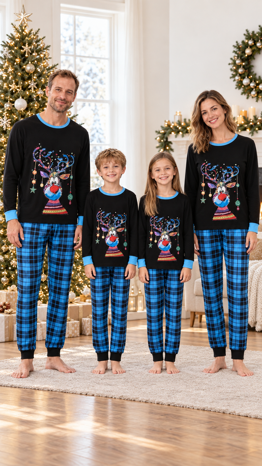Family in matching black Christmas pajama tops with an ornament reindeer and sky-blue trim, worn with blue and black plaid pants.