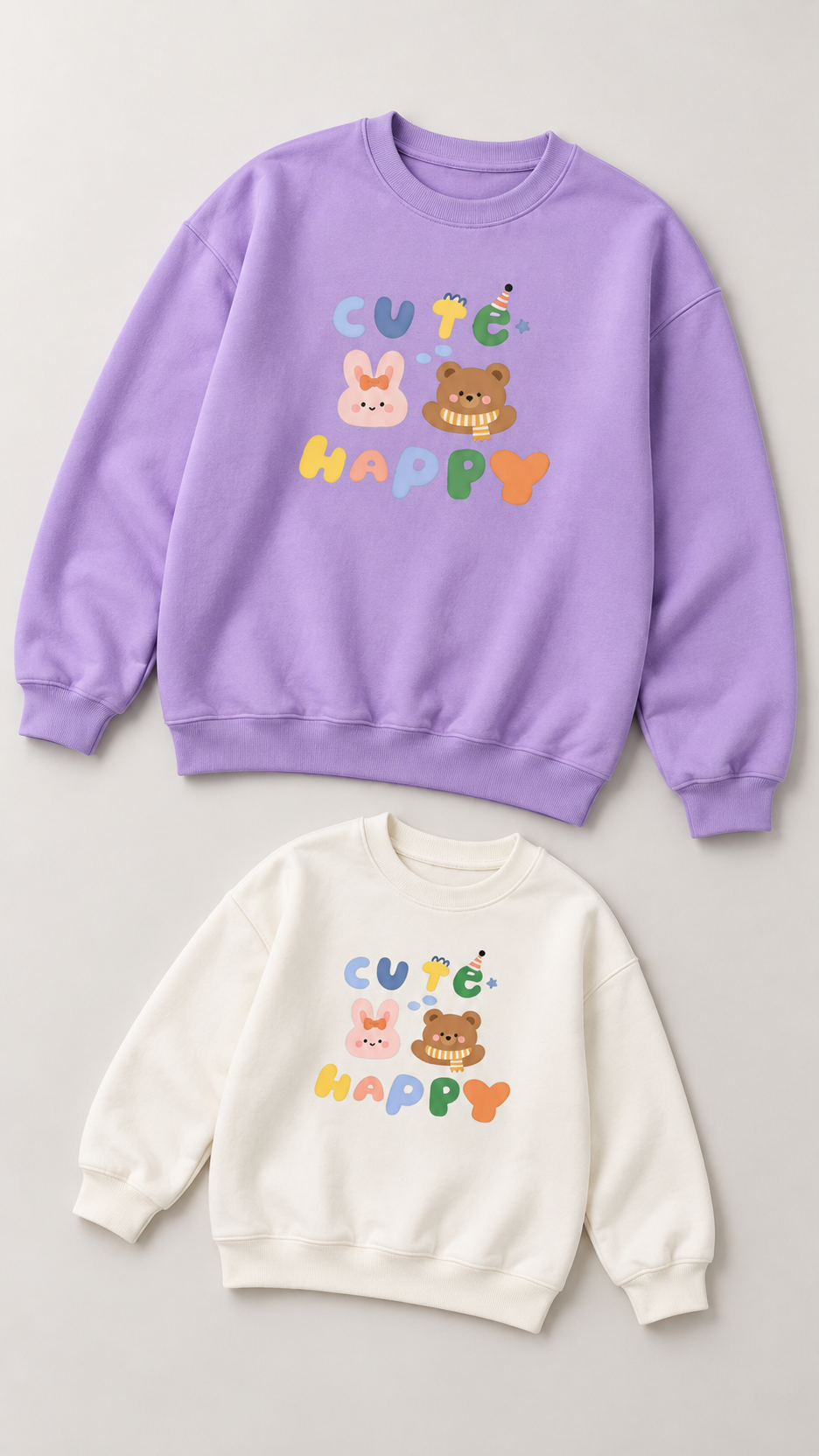 Cute Happy Bunny Bear matching sweatshirts for an adult and a child, laid out without models.