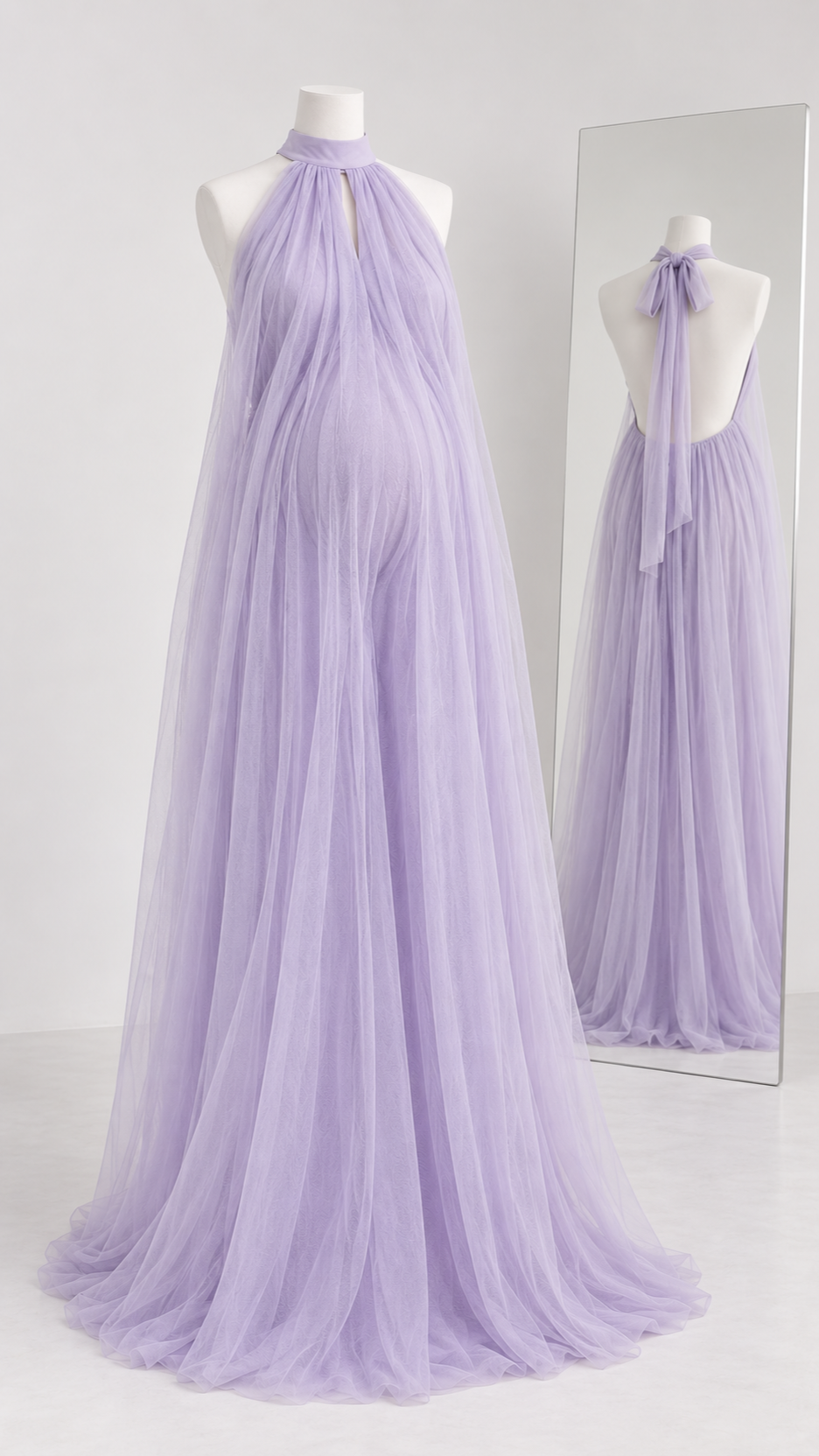 Lavender halter mesh maternity gown with an open back and a bow at the neck on a dress form