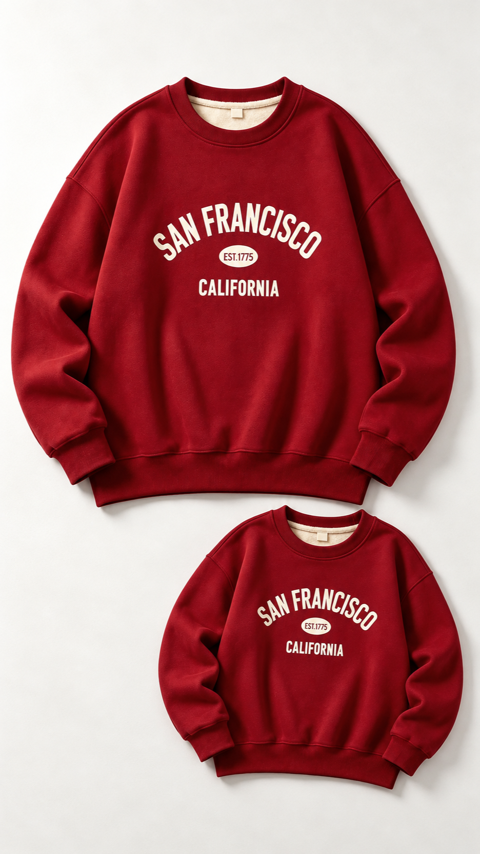 San Francisco matching sweatshirts for an adult and a child, laid out without models.
