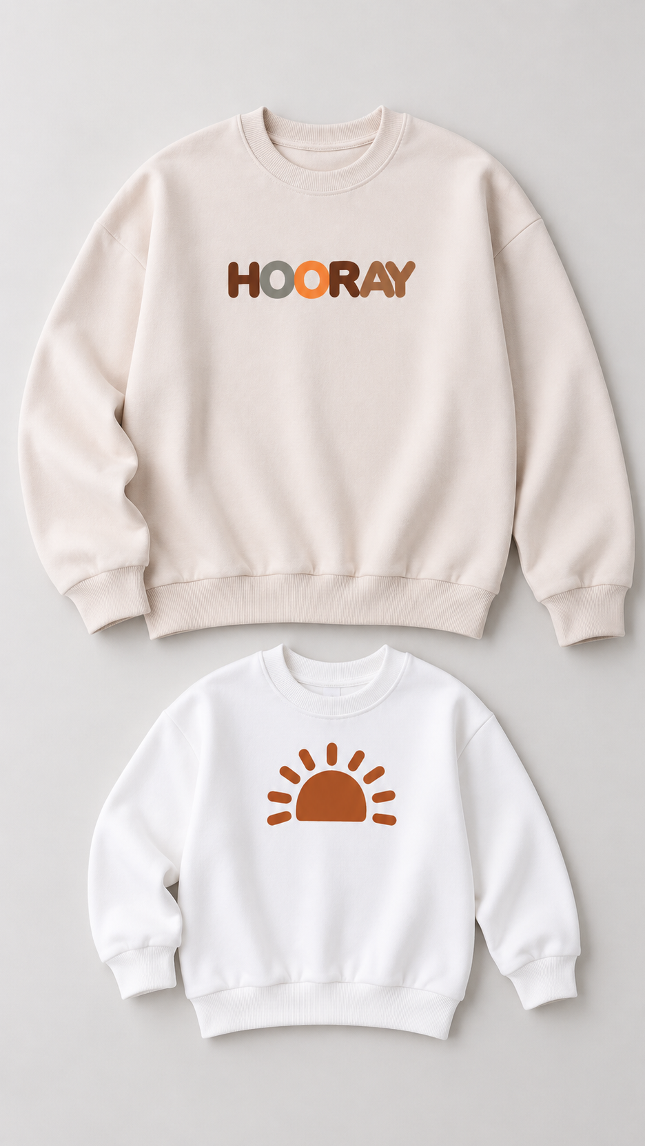 Hooray Sun matching sweatshirts for an adult and a child, laid out without models.