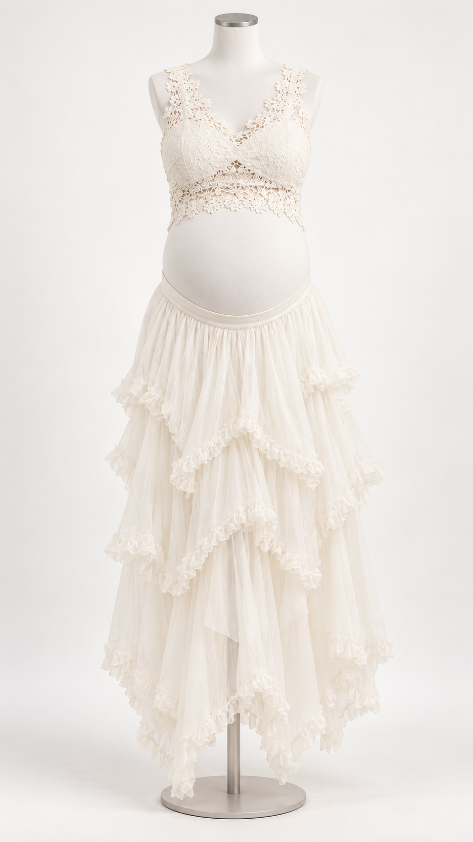 Ivory floral lace crop top and tiered ruffle skirt maternity set on a dress form