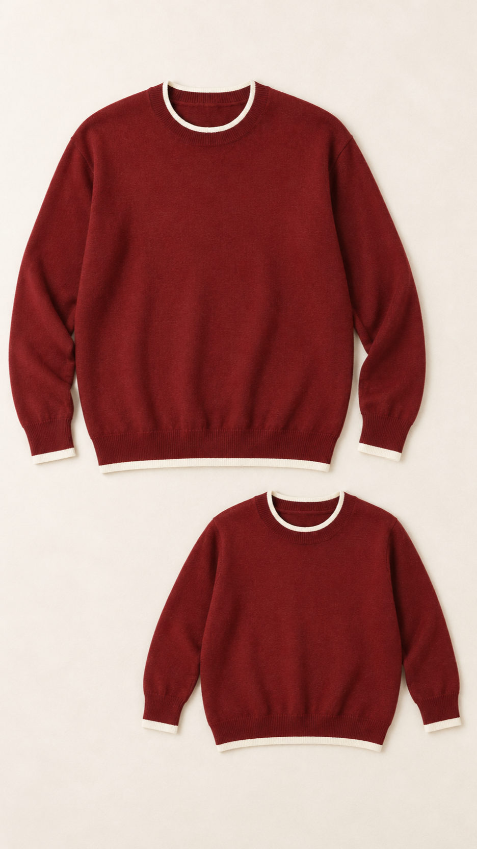 Burgundy Trim Crew matching knit sweaters for a man and a child, laid out without models.