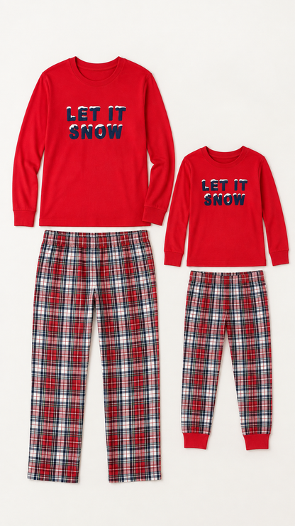 Let It Snow matching Christmas pajama sets for an adult and a child, laid out without models.