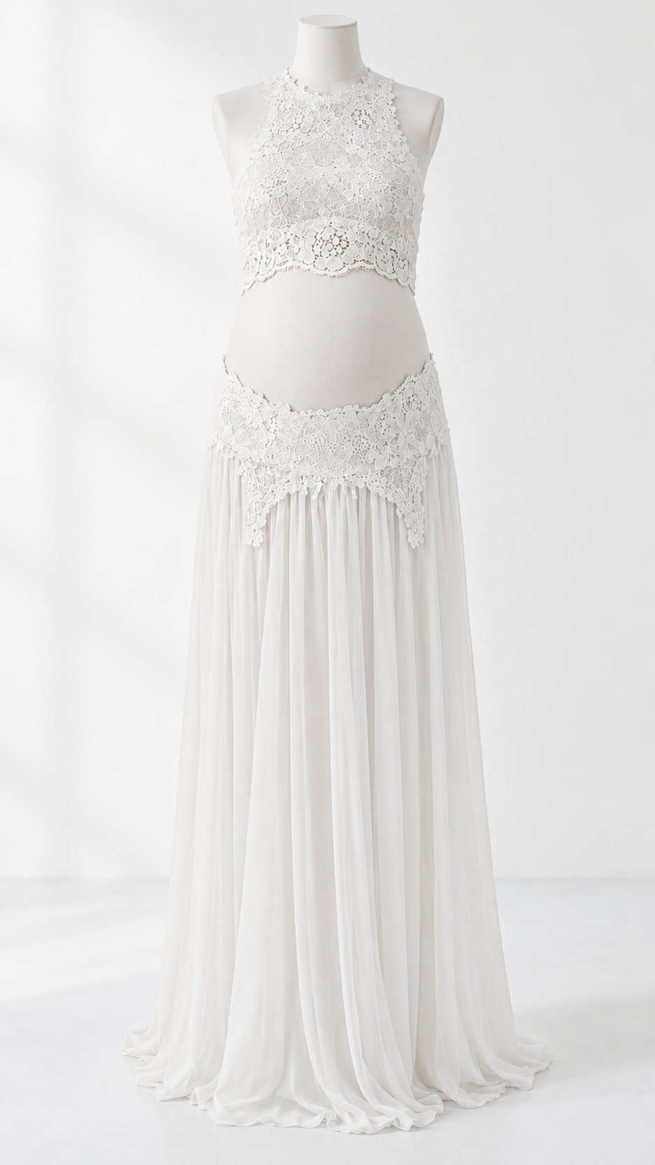 White lace halter crop top and long flowing skirt maternity set on a dress form