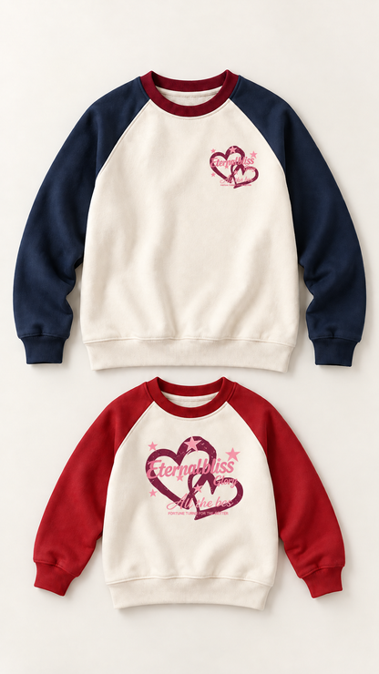 Eternal Bliss Hearts matching sweatshirts for an adult and a child, laid out without models.