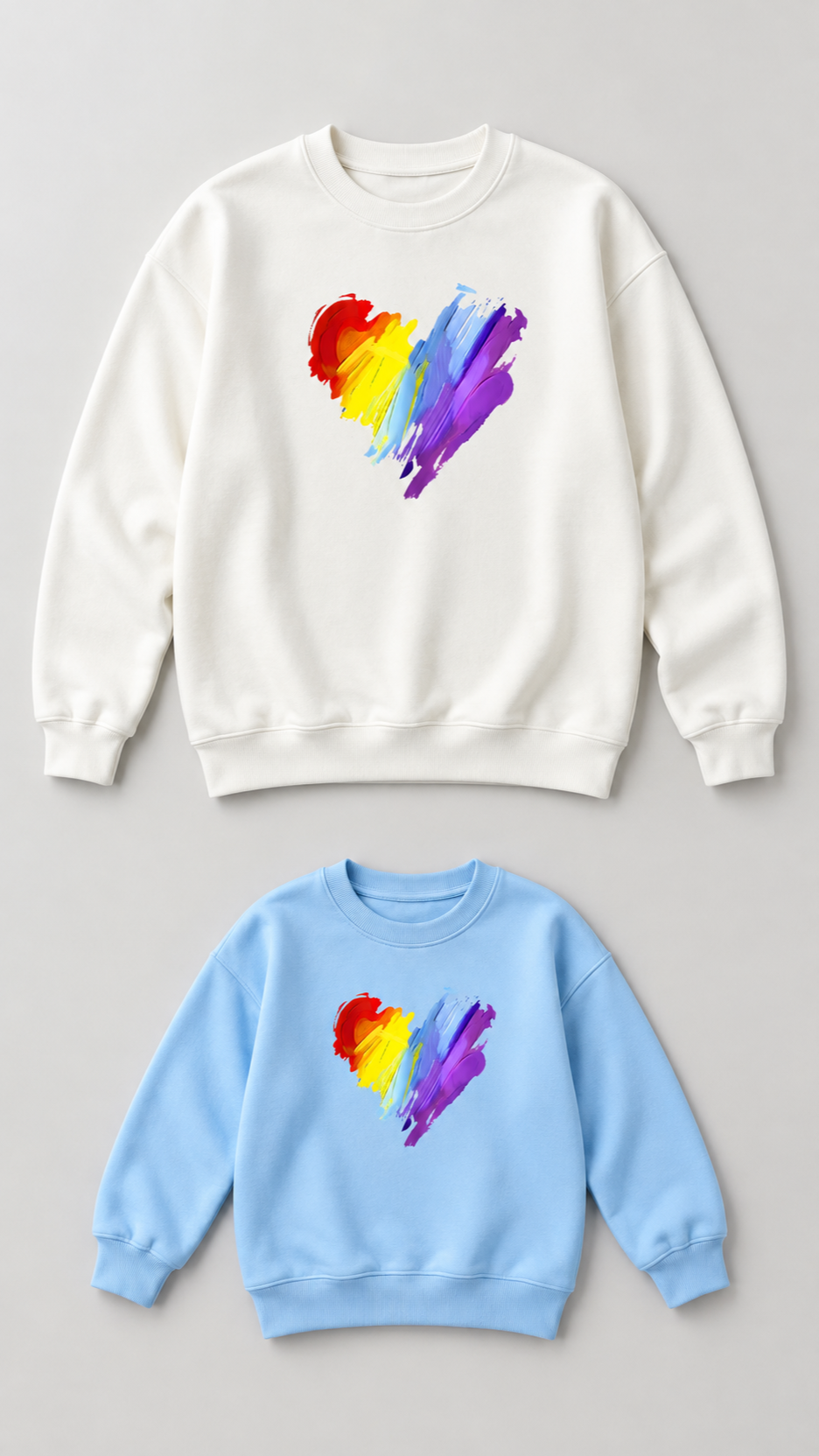 Scribble Heart matching sweatshirts for an adult and a child, laid out without models.