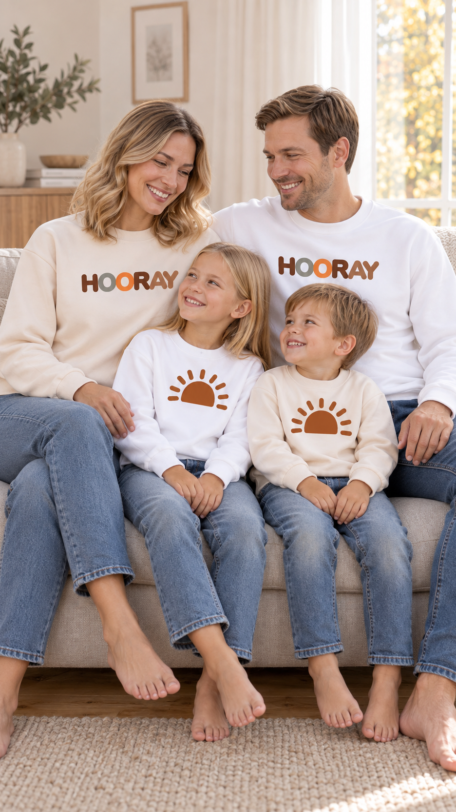 Family relaxing together at home in matching Hooray Sun sweatshirts.