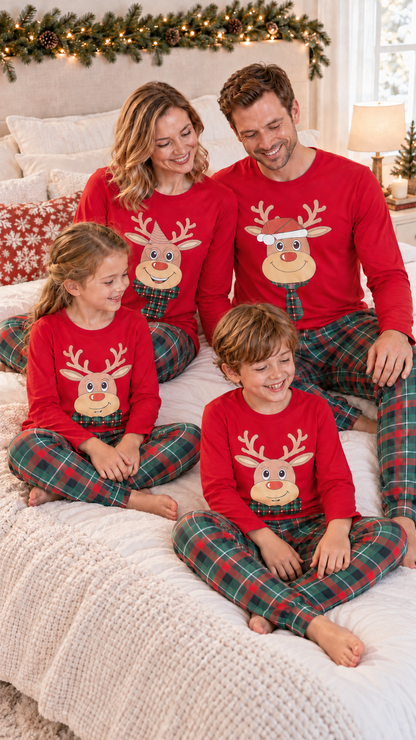 Family relaxing together at home in matching Plaid Reindeer Christmas pajamas.