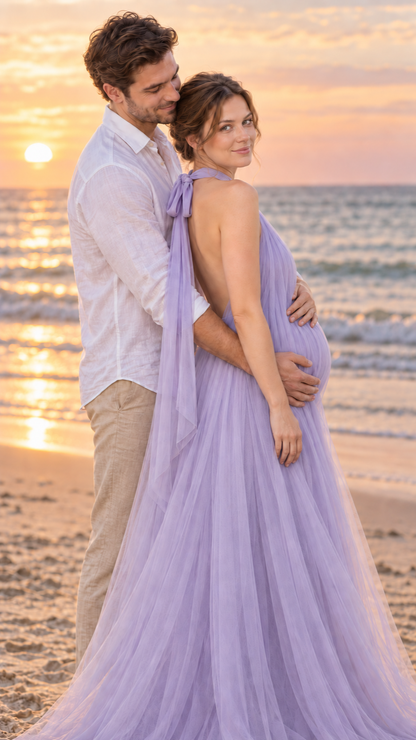 Expecting mother in a lavender halter mesh maternity gown with her partner