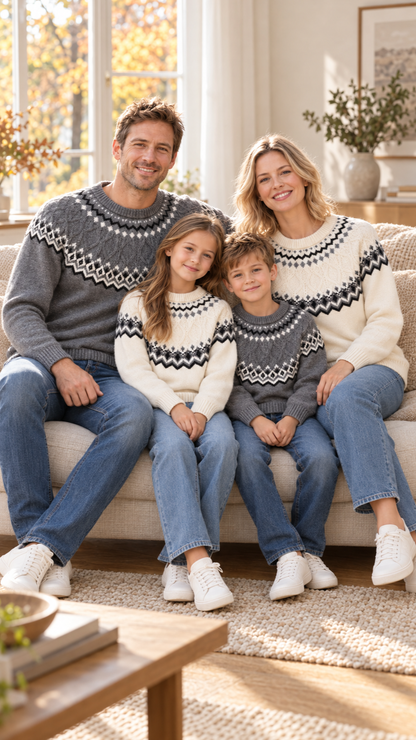 Family relaxing together at home in matching Nordic Yoke knit sweaters.