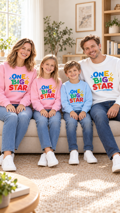 Family relaxing together at home in matching One Big Star sweatshirts.