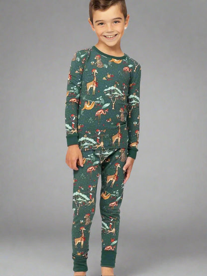 Matching family Christmas pajamas with green forest animal print for holiday season