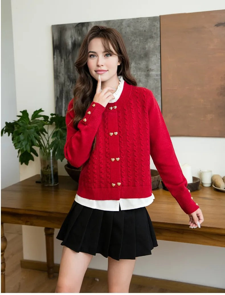 Family of four dressed in matching red cable knit sweaters, perfect for holiday celebrations or family portraits