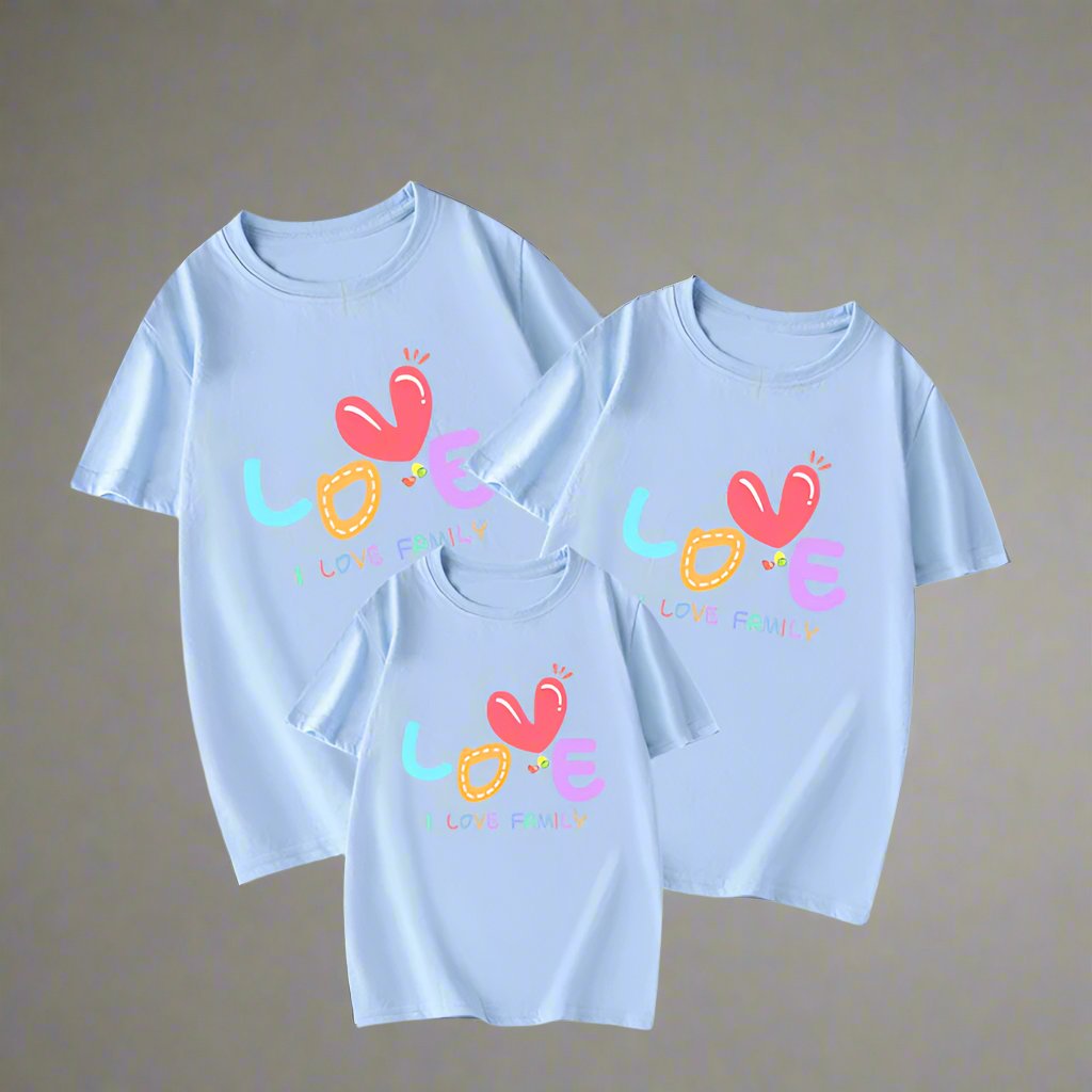Matching family outfits with heart-inspired 'Love' design in red, black, white, and blue