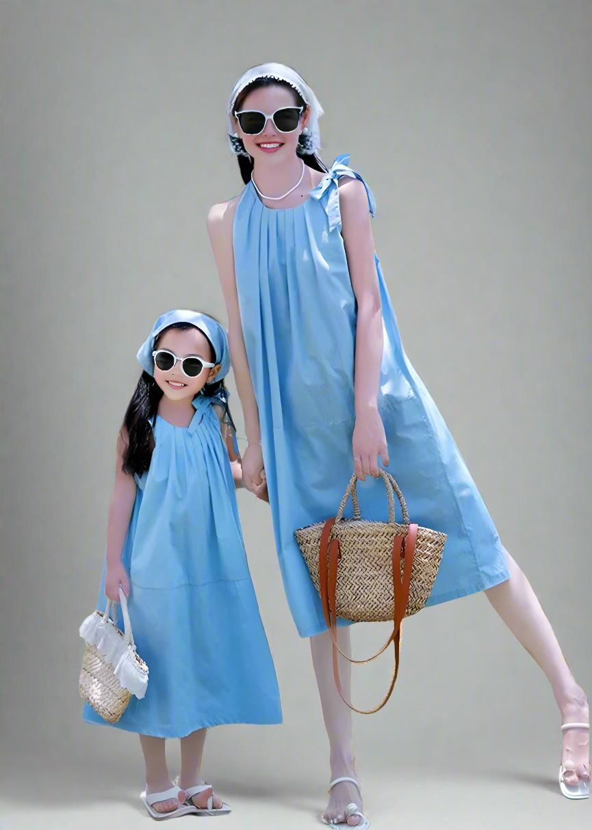 Mother-daughter matching blue dresses perfect for summer vacations and outdoor outings