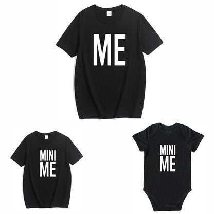 Father and baby wearing playful 'Me' and 'Mini Me' t-shirts, ideal for family photos