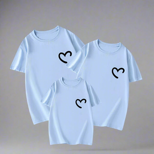 Matching family shirts with minimalist heart design in blue, pink, black, and white