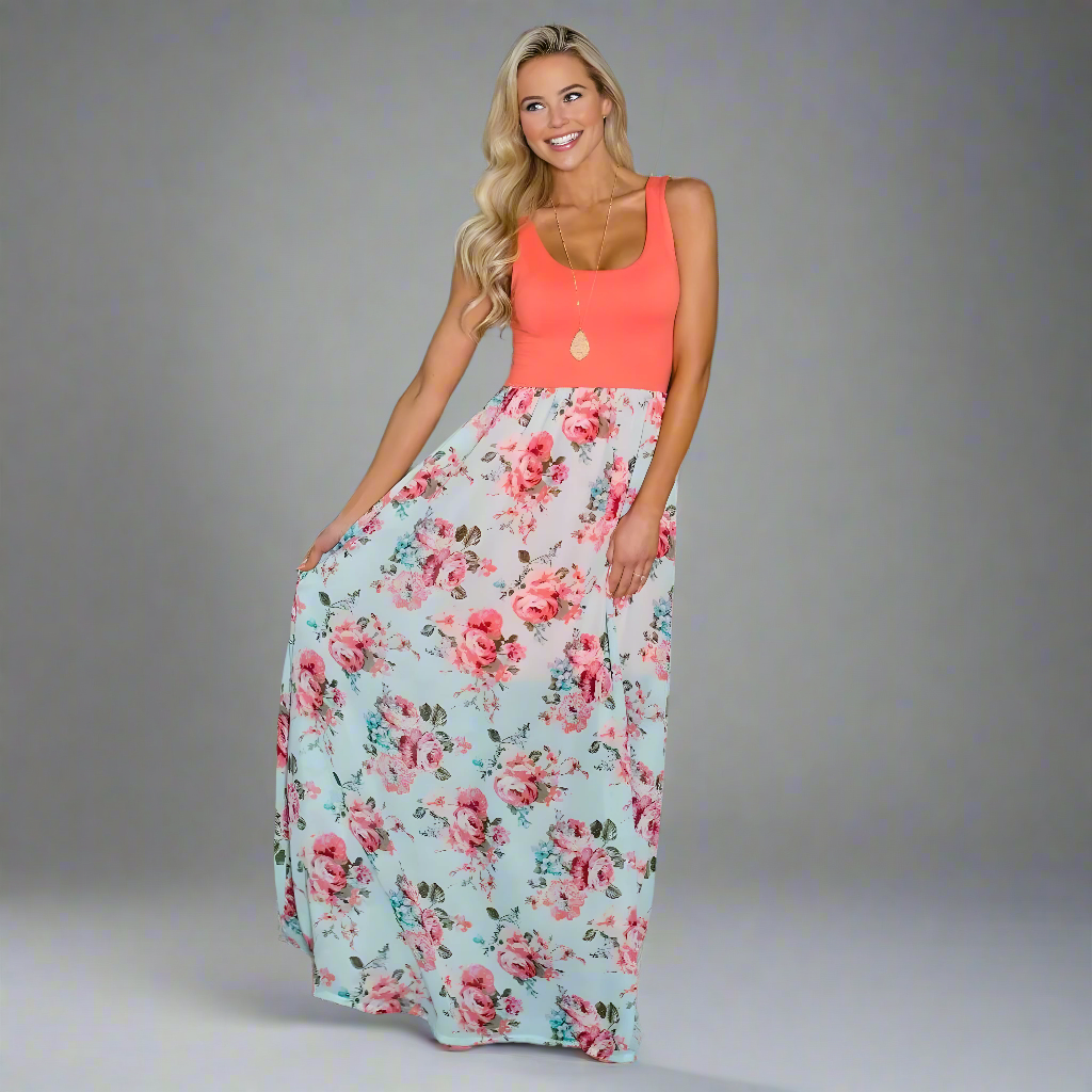 Mommy and me matching orange floral maxi dresses, ideal for family gatherings