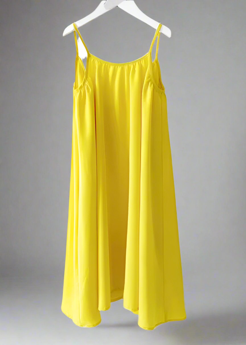 Mommy and me matching yellow maxi dresses for a summer vacation