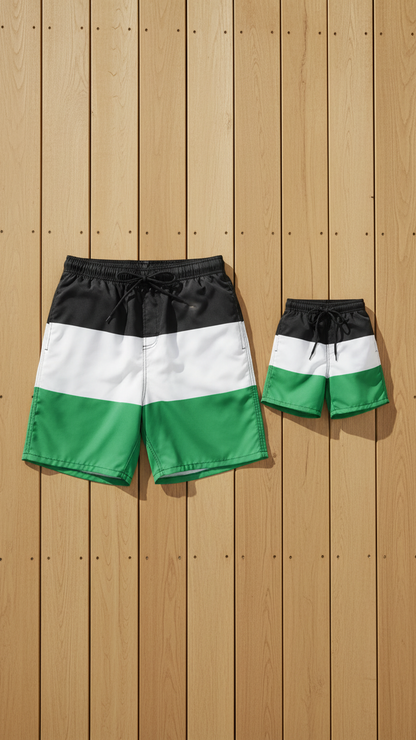 Alternate image of family matching swim trunks with green striped