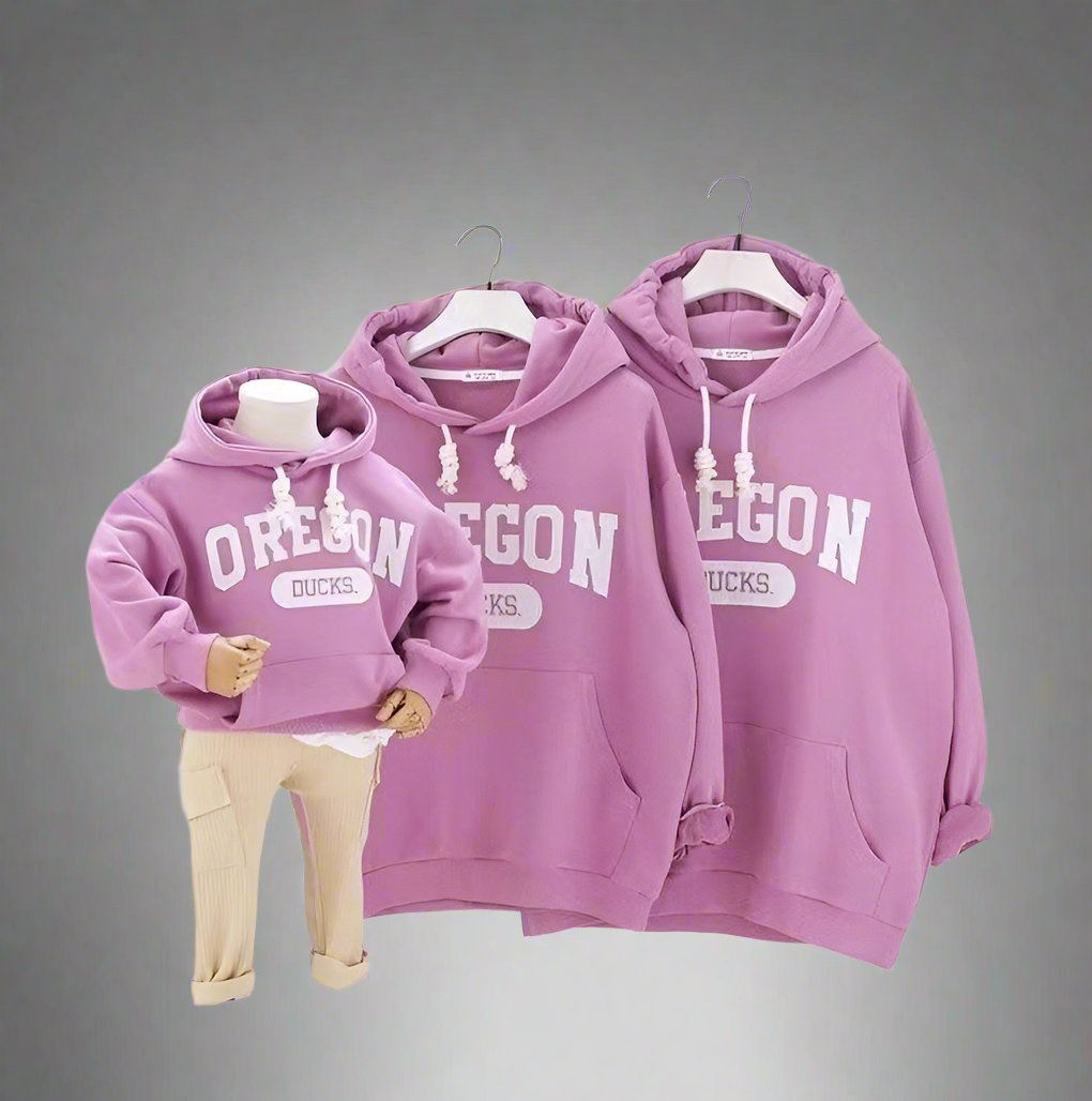 Purple matching family sweatshirts with Oregon logo design