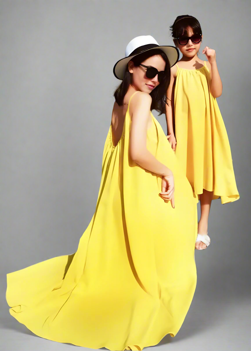 Bright yellow matching dresses for mom and daughter summer vacation
