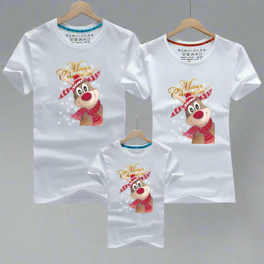 White family matching t-shirts with a festive reindeer wearing a scarf and 'Merry Christmas' text