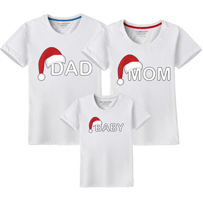 White family Christmas matching shirts featuring Santa hat design with 'Dad,' 'Mom,' and 'Baby' lettering