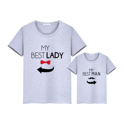 Close product view of family matching t-shirts with graphic print