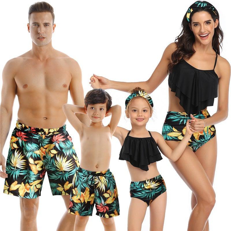Close product view of family matching swimsuits with floral print